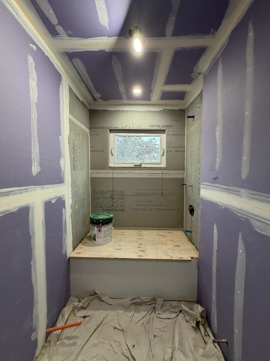 Drywall with joint compound and tape applied