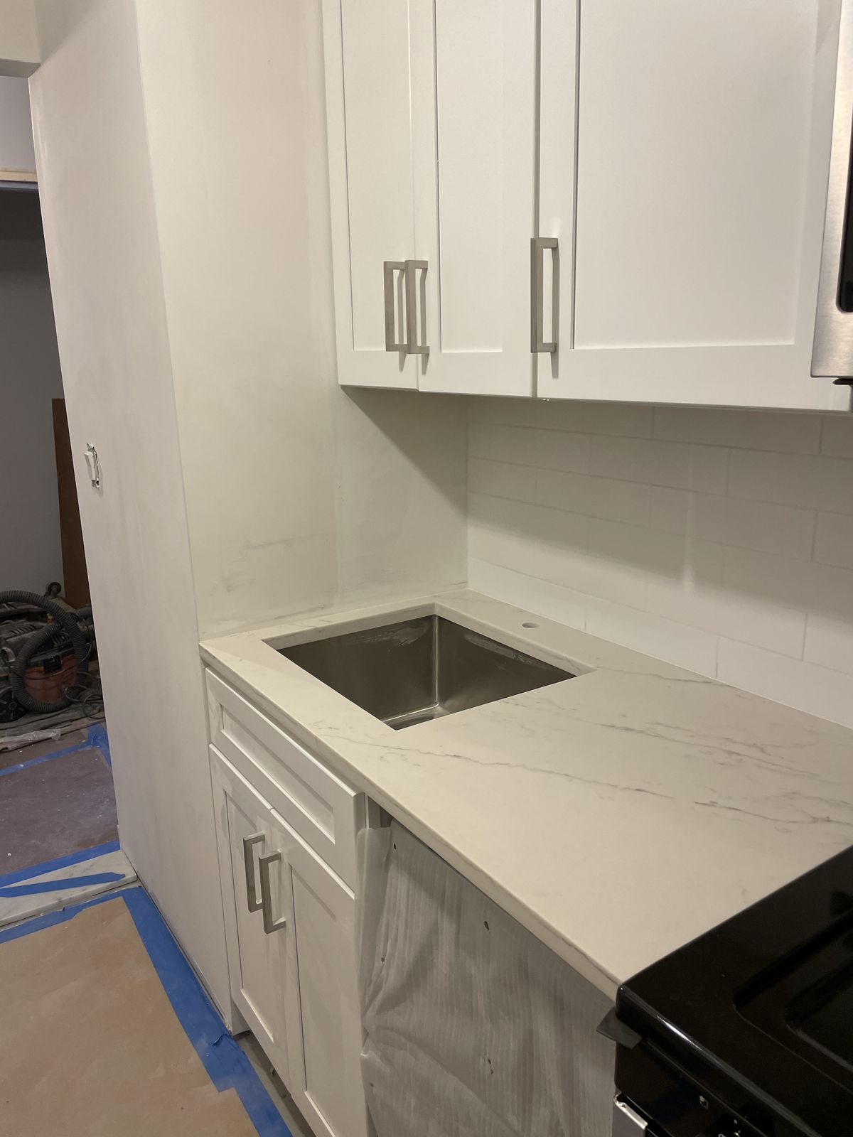 Kitchen countertop being templated for precision stone cutting