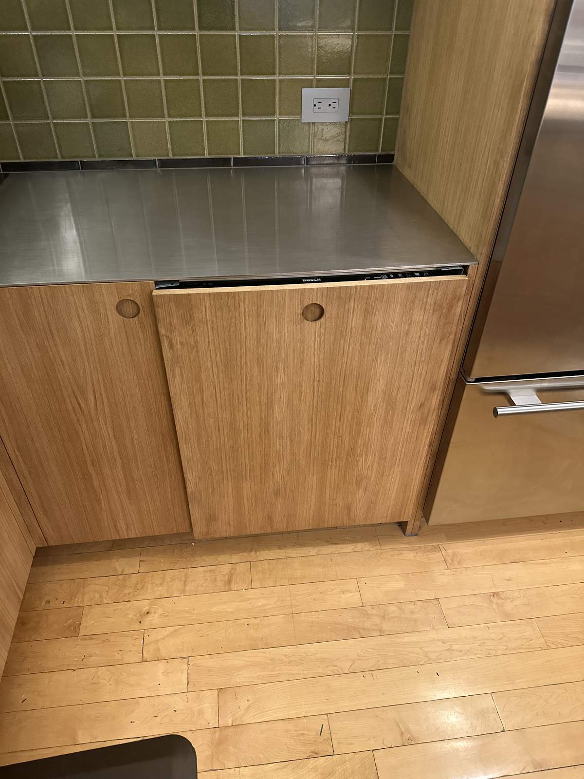 Custom entryway built-in bench with coat hooks and overhead storage