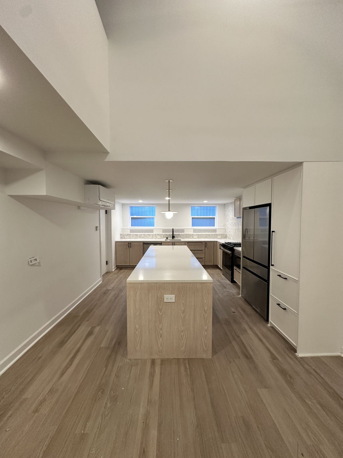 Custom shelving unit with integrated display lighting